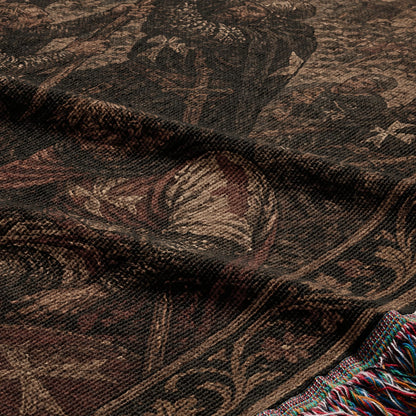 Dark tapestry with intricate, muted medieval-style pattern and fringed edge.