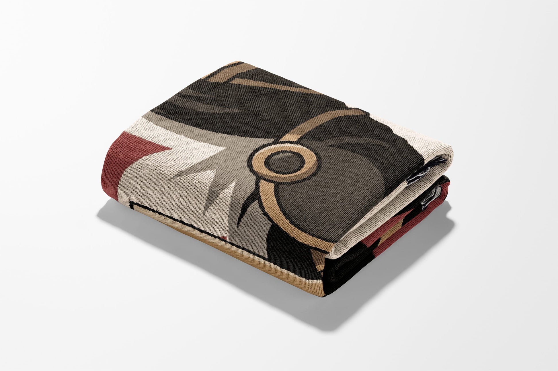 Folded blanket with a patterned design featuring a character's face and armor.