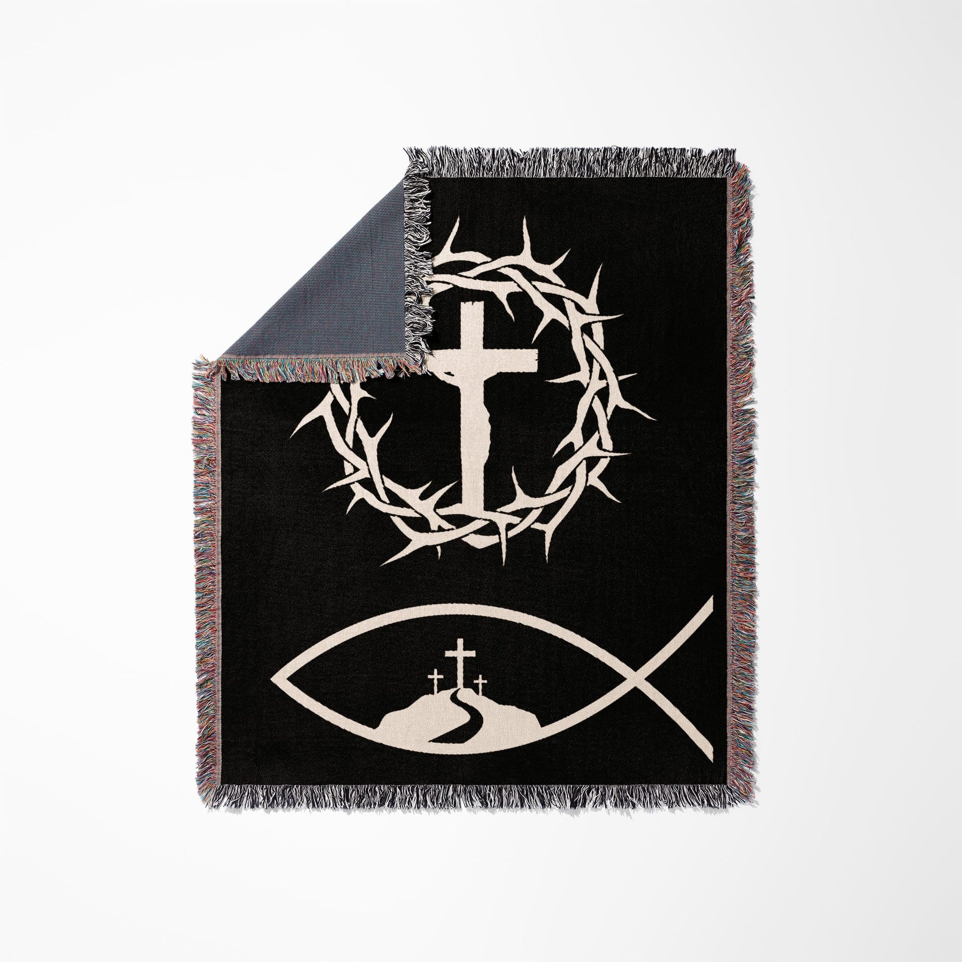 Black throw blanket with white Jesus on the cross, fish symbol, and crown of thorns.