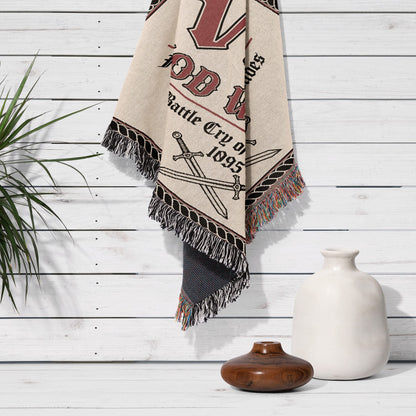 Cream blanket with black fringe, featuring crossed swords and text "GOD's Battle Cry 1095".