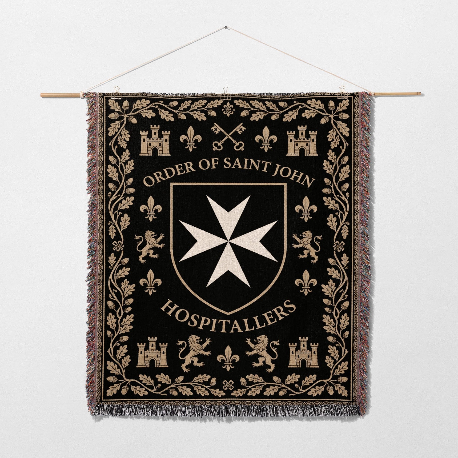 Black tapestry with Order of Saint John crest and "Hospitallers" text.