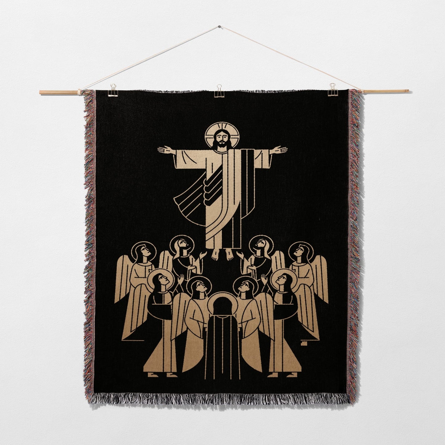 Jesus surrounded by angels on a black tapestry.