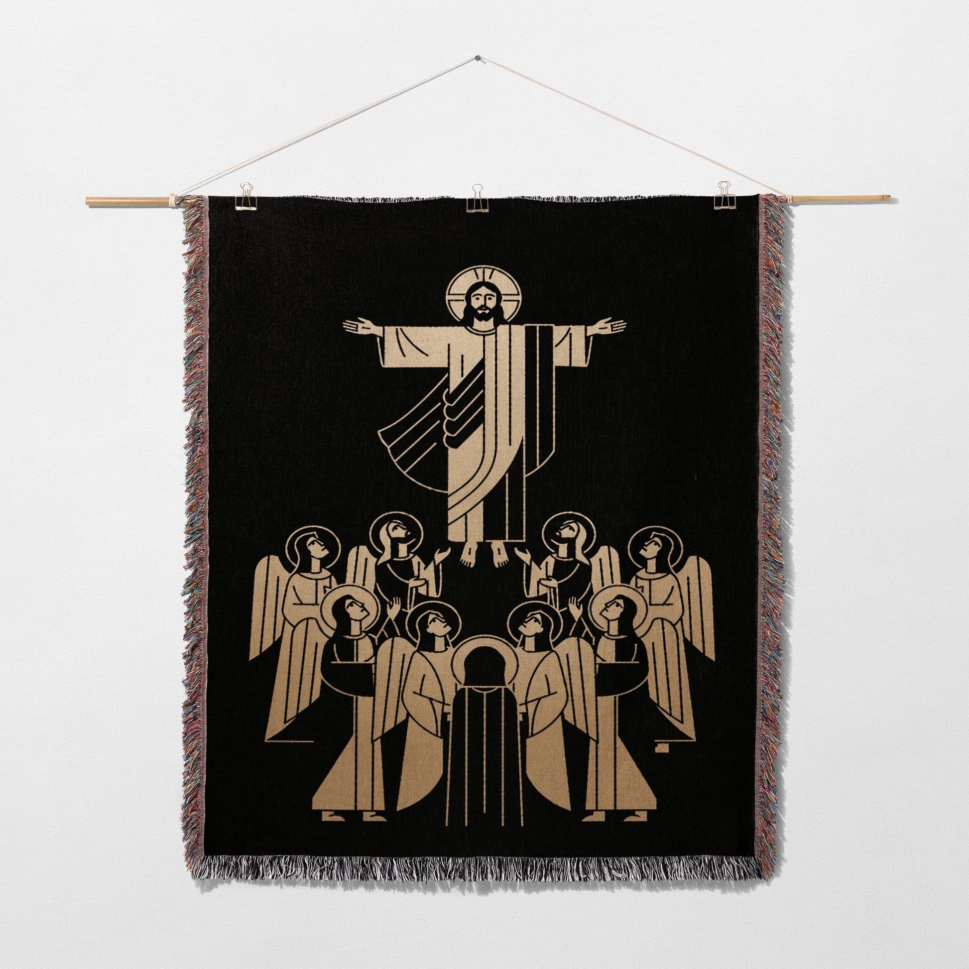 Jesus surrounded by angels on a black tapestry.