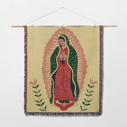 Woven tapestry featuring Our Lady of Guadalupe with floral accents.