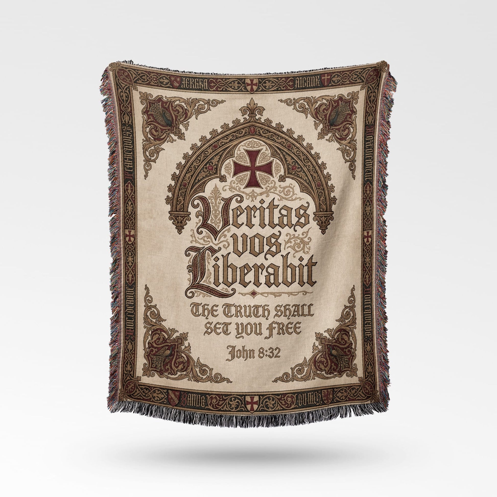 Woven tapestry blanket with Latin and English inscription "Veritas vos Liberabit" and John 8:32.