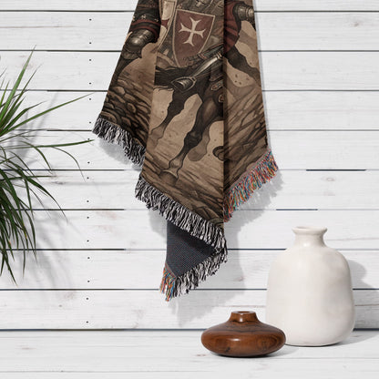 Brown blanket with knight and horse design hangs on white wall.