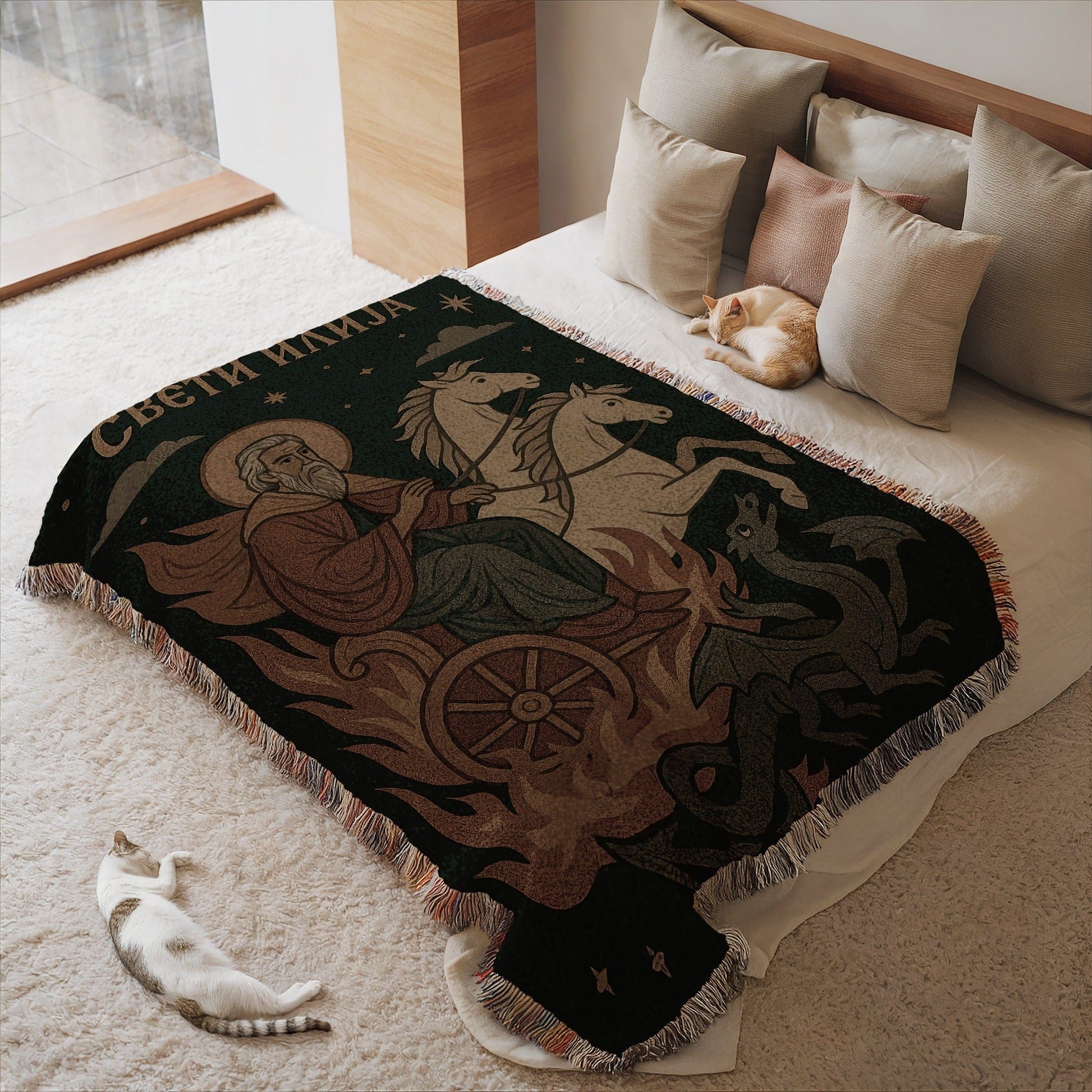 Saintly figure riding a chariot with cats on blanket