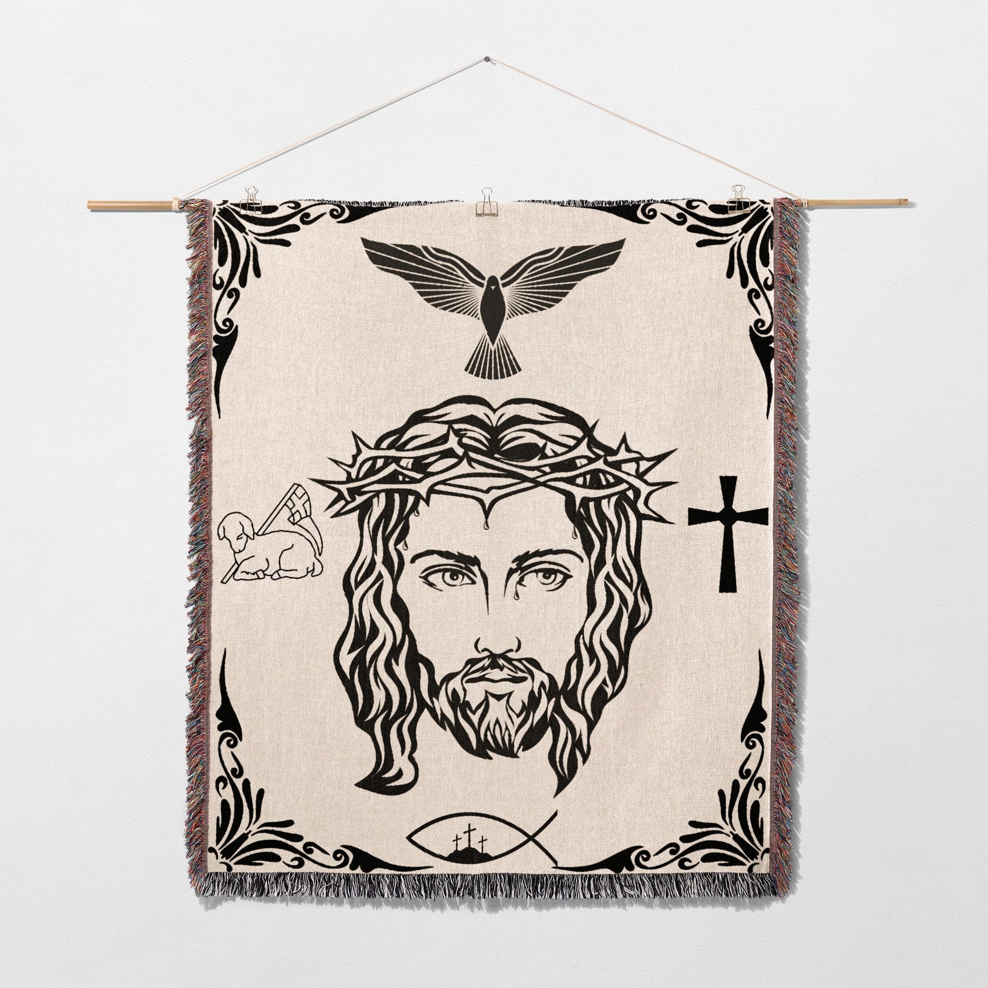 Jesus Christ's face with crown of thorns, dove, lamb, fish, and cross symbols.
