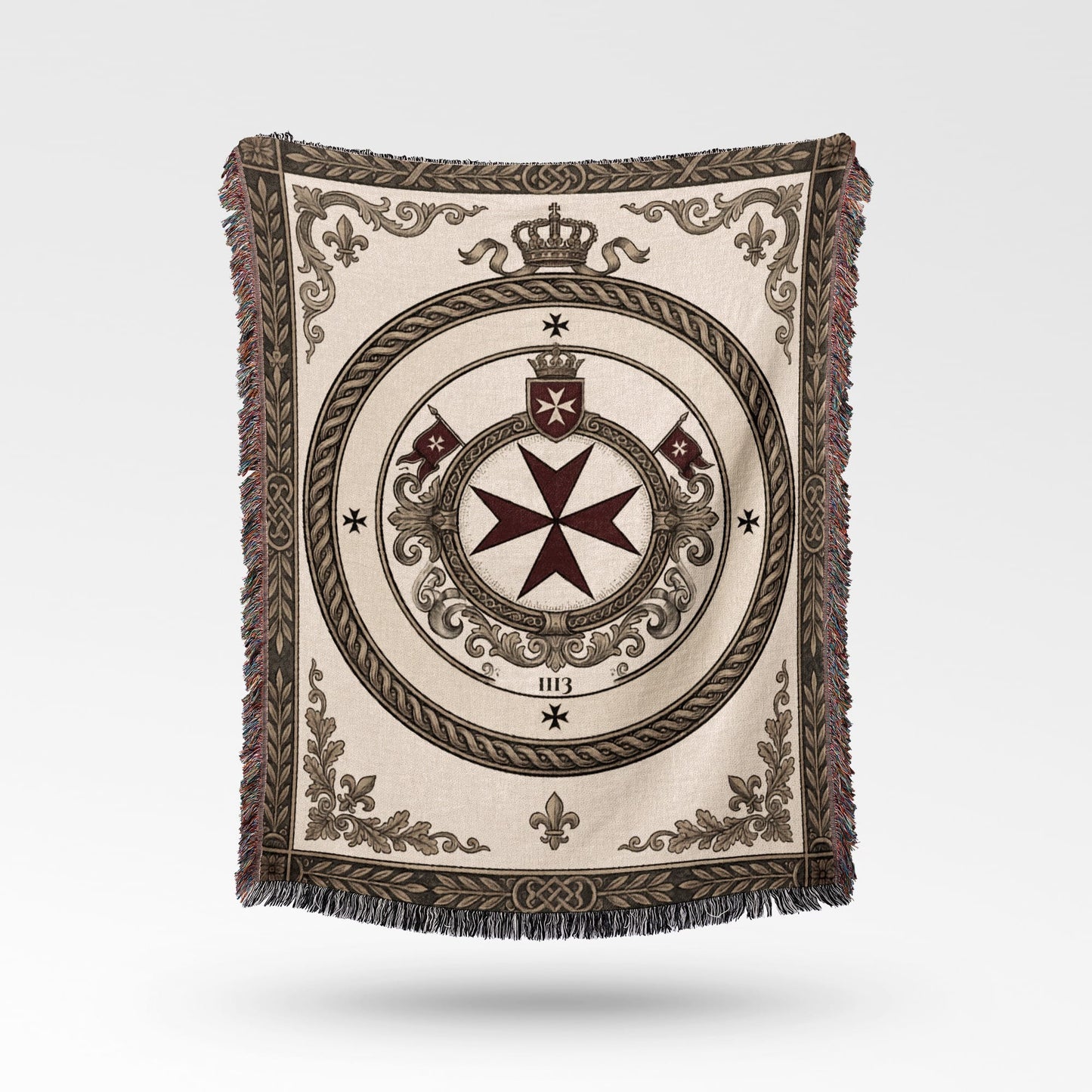 Woven blanket with cream border, crown, and Maltese cross emblem.