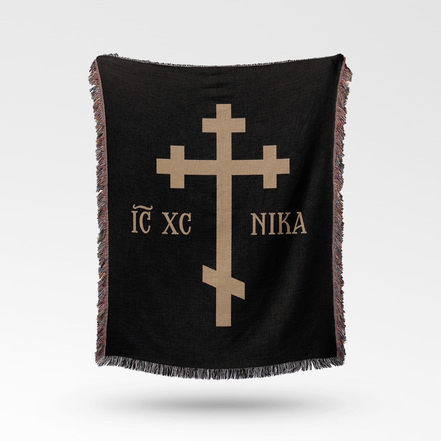 Black throw blanket with gold Greek Orthodox cross and text "IC XC NI KA".