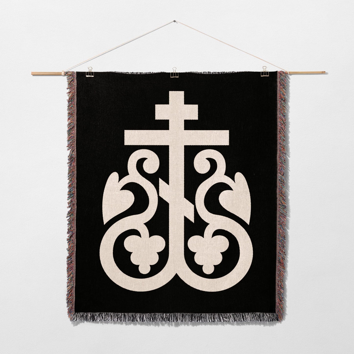 Black tapestry with cream Byzantine cross and ornate scrollwork design.