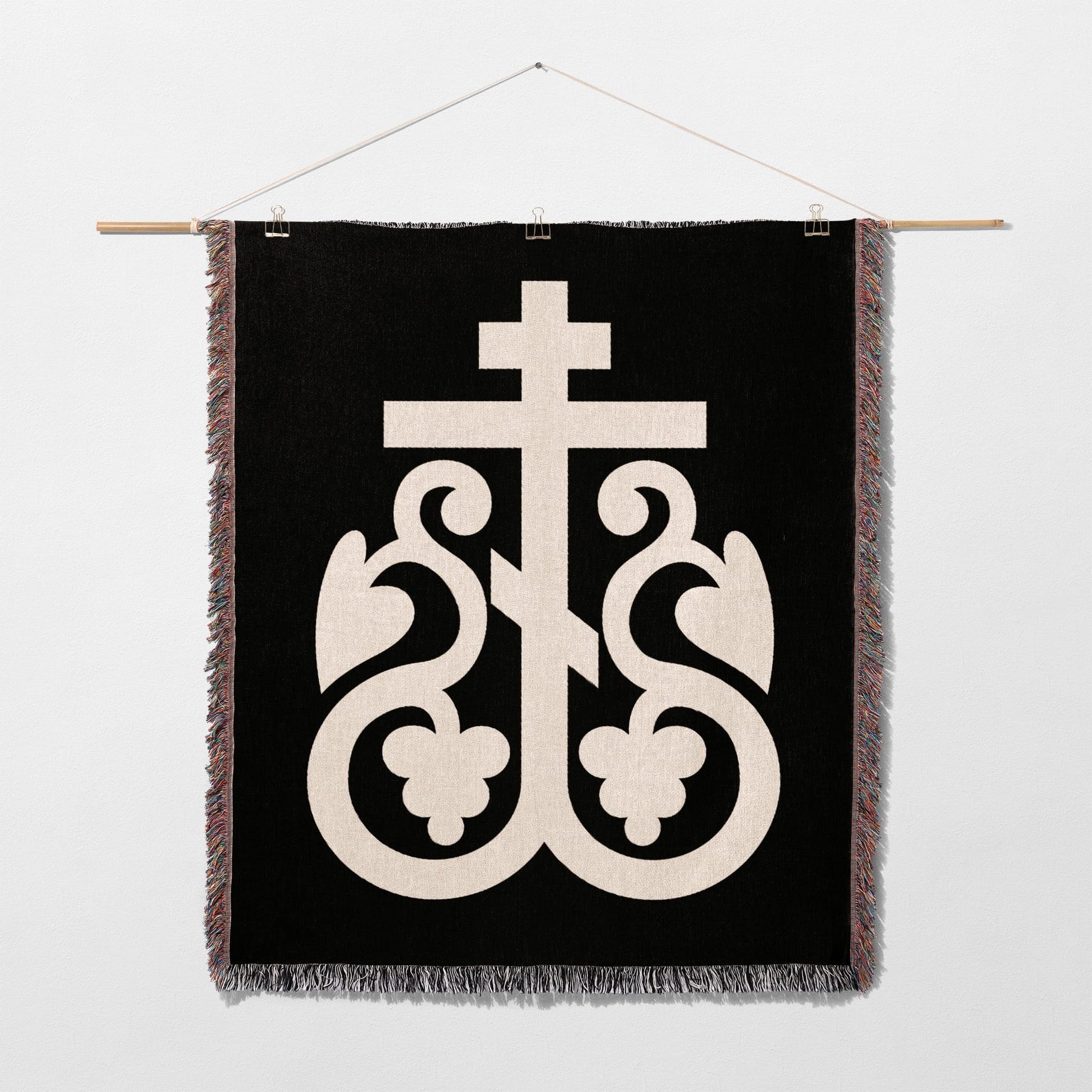 Black tapestry with cream Byzantine cross and ornate scrollwork design.