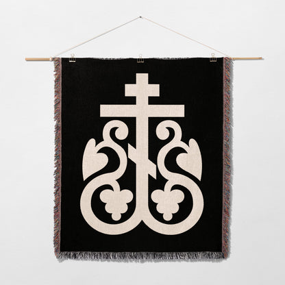 Black tapestry with cream Byzantine cross and ornate scrollwork design.