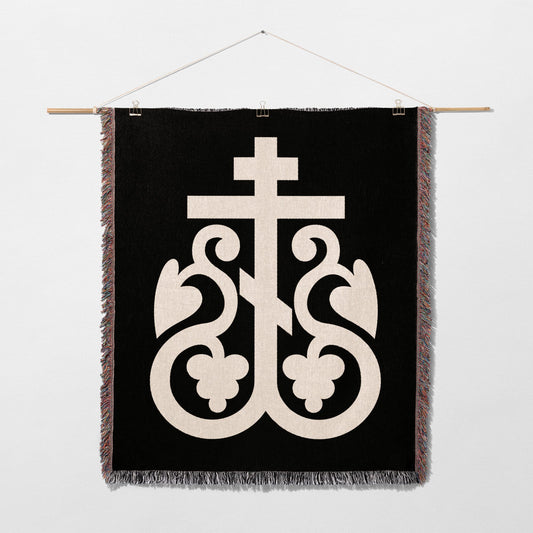 Black tapestry with cream Byzantine cross and ornate scrollwork design.
