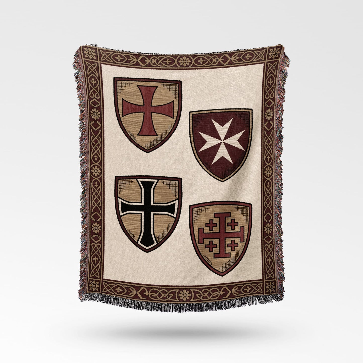 Woven blanket with four medieval cross shields and decorative border.