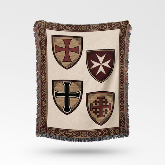 Woven blanket with four medieval cross shields and decorative border.