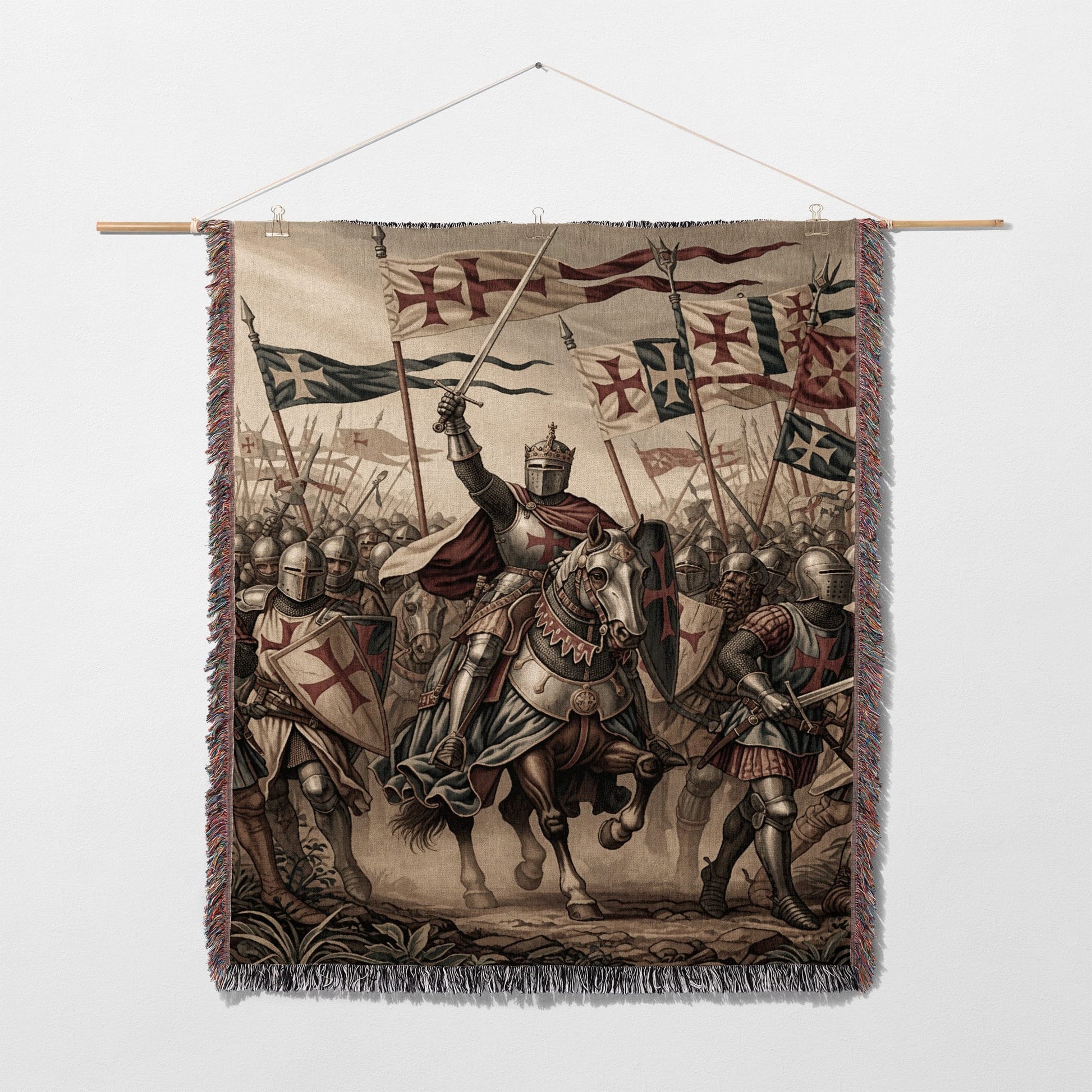 Knights in armor on horseback and foot charge forward under banner-adorned flags.