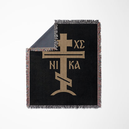 Black throw blanket with gold Orthodox Christian cross and text "INRI".