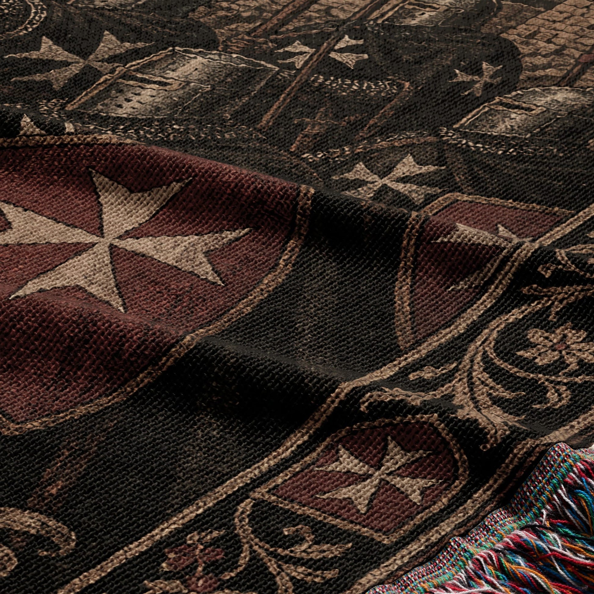 Tapestry with Maltese crosses and ornate scrollwork, featuring fringe detail.