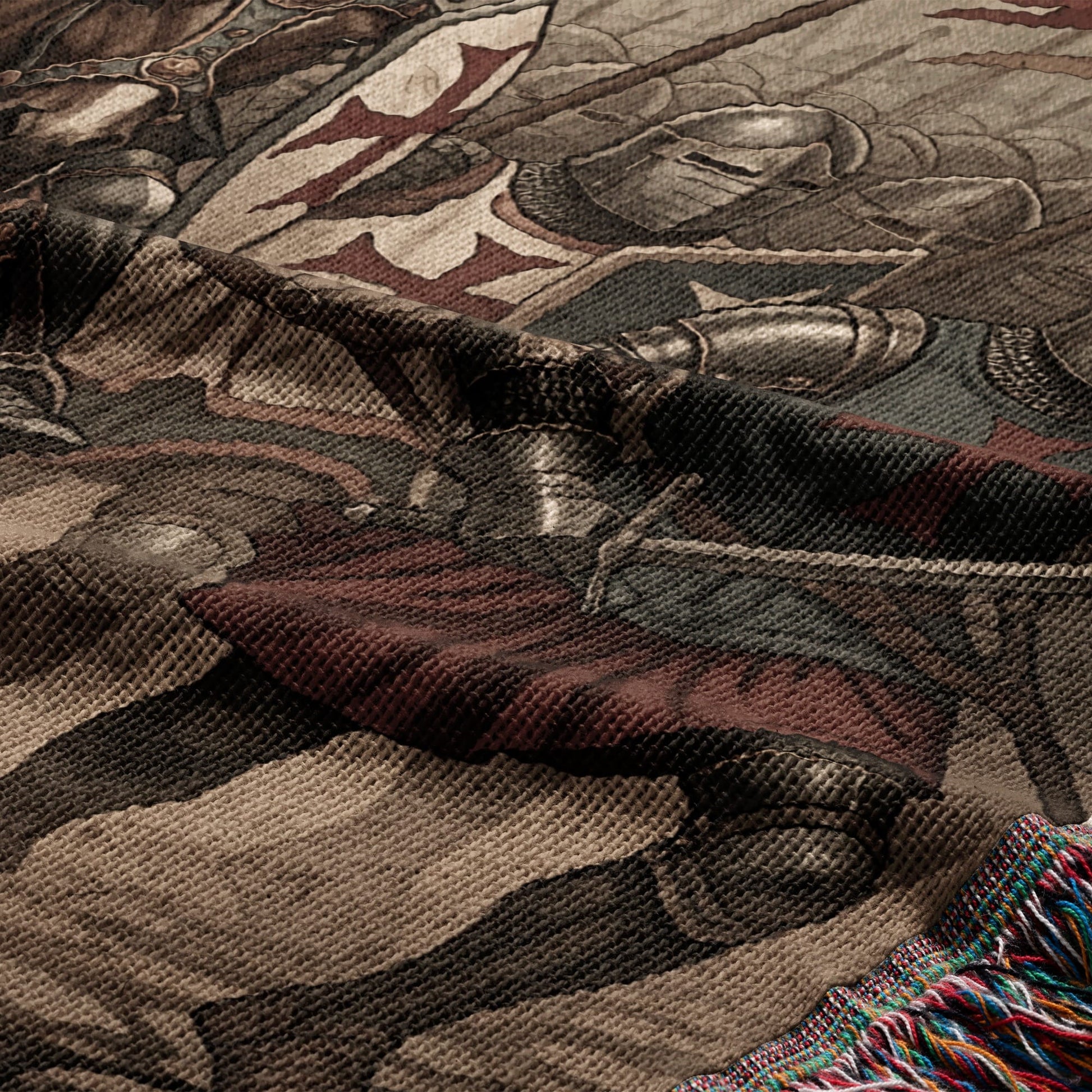 Knights in armor woven into a tapestry, with fringed edge.