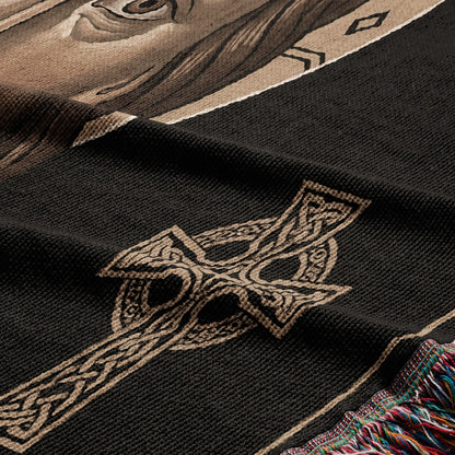 Woven tapestry with Celtic knot and part of a horse's face.