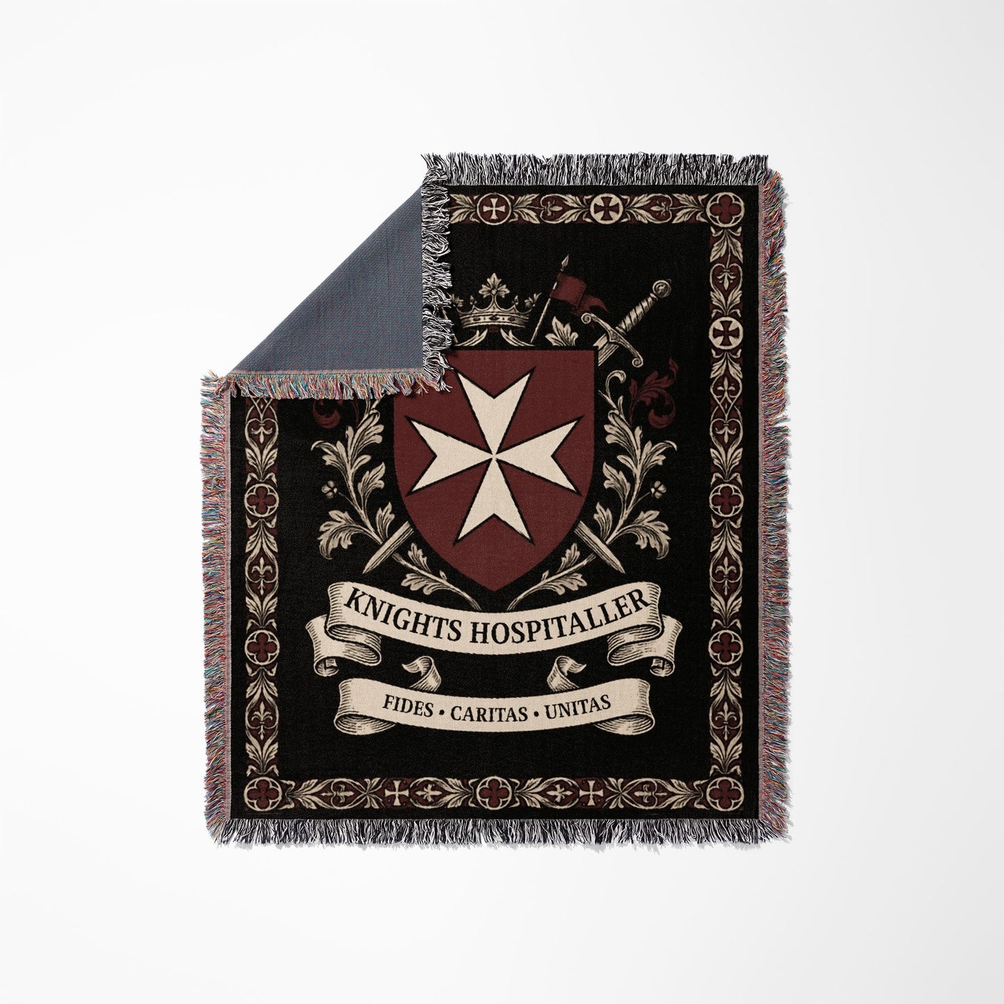 Knights Hospitaller crest with swords, crown, and Latin motto on a black woven blanket.