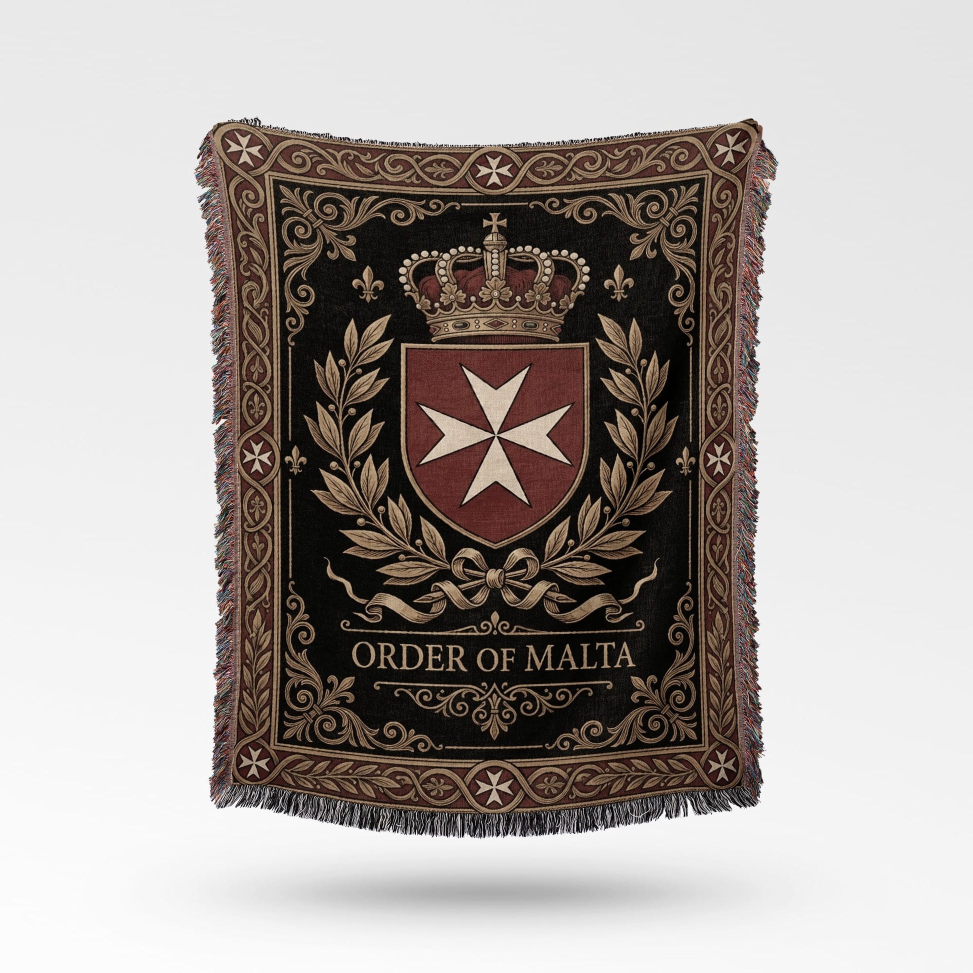 Tapestry blanket with Order of Malta crest and crown on dark background.