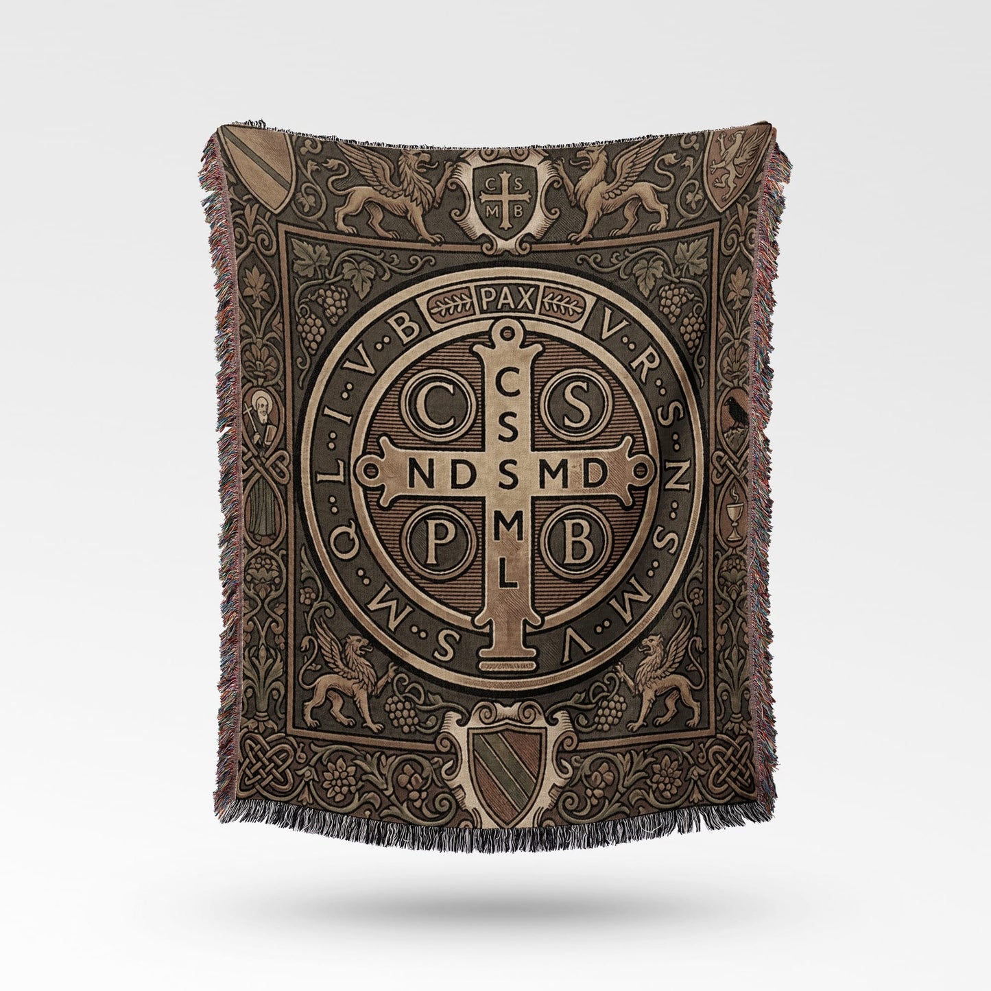 Tapestry throw featuring a Saint Benedict medal design with griffins and ornate borders.