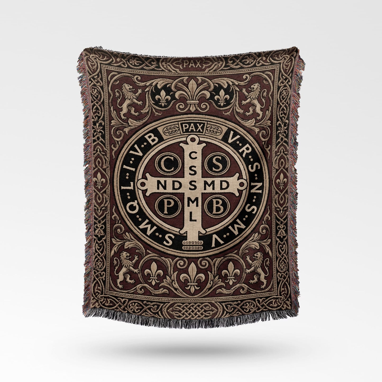 Woven throw blanket with St. Benedict medal, fleur-de-lis, and lion motifs.