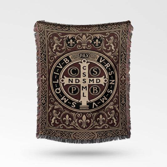 Woven throw blanket with St. Benedict medal, fleur-de-lis, and lion motifs.