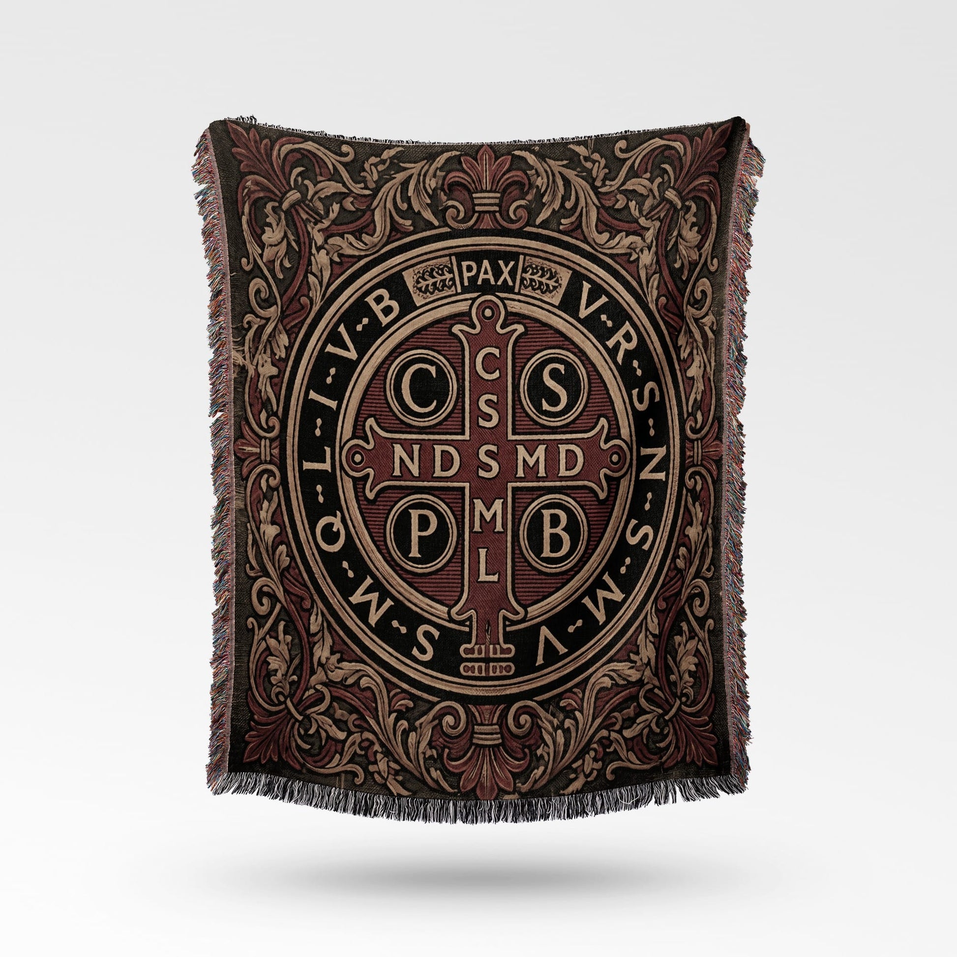 Tapestry throw featuring the Saint Benedict medal design in red and gold.