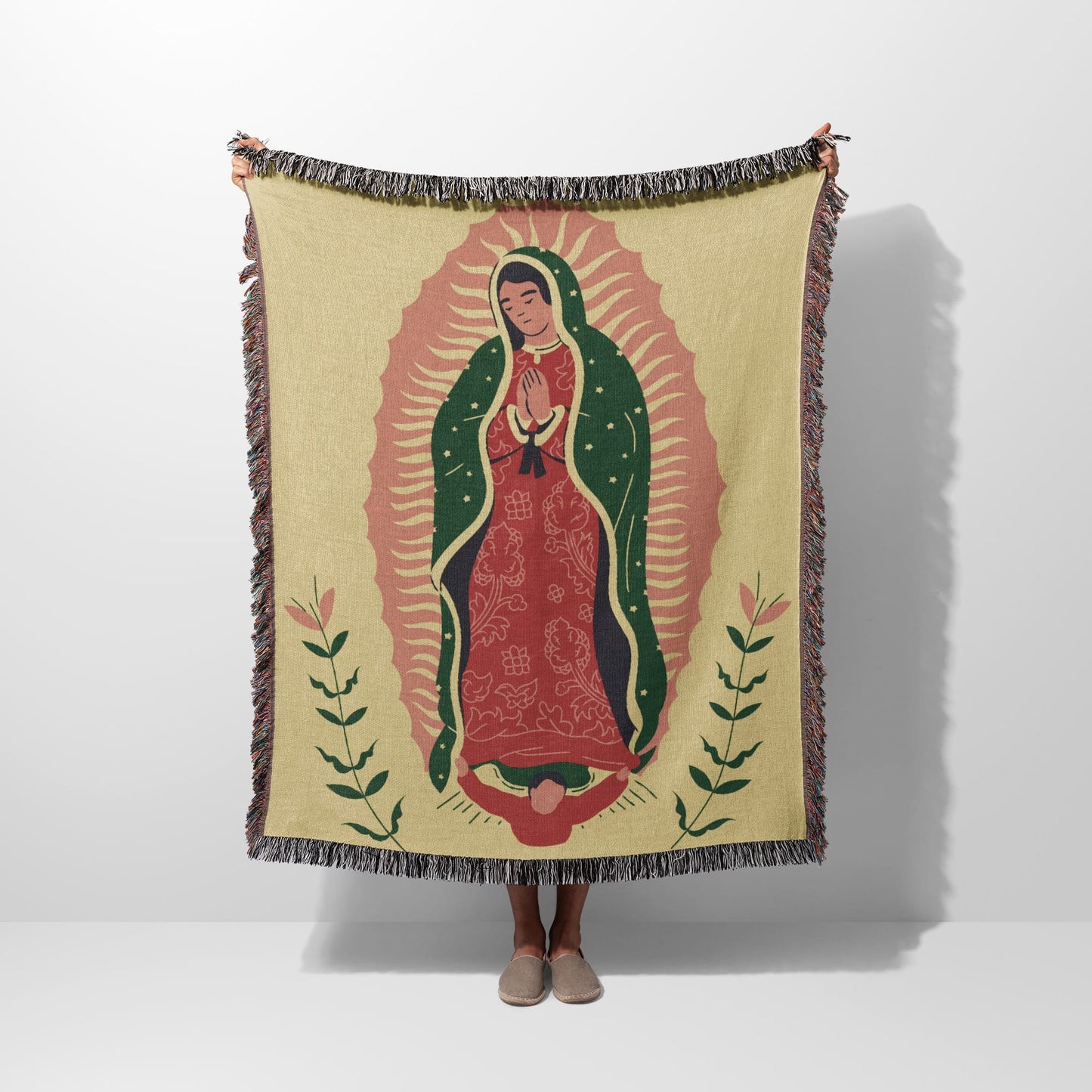 Woven tapestry blanket featuring the Virgin of Guadalupe design.