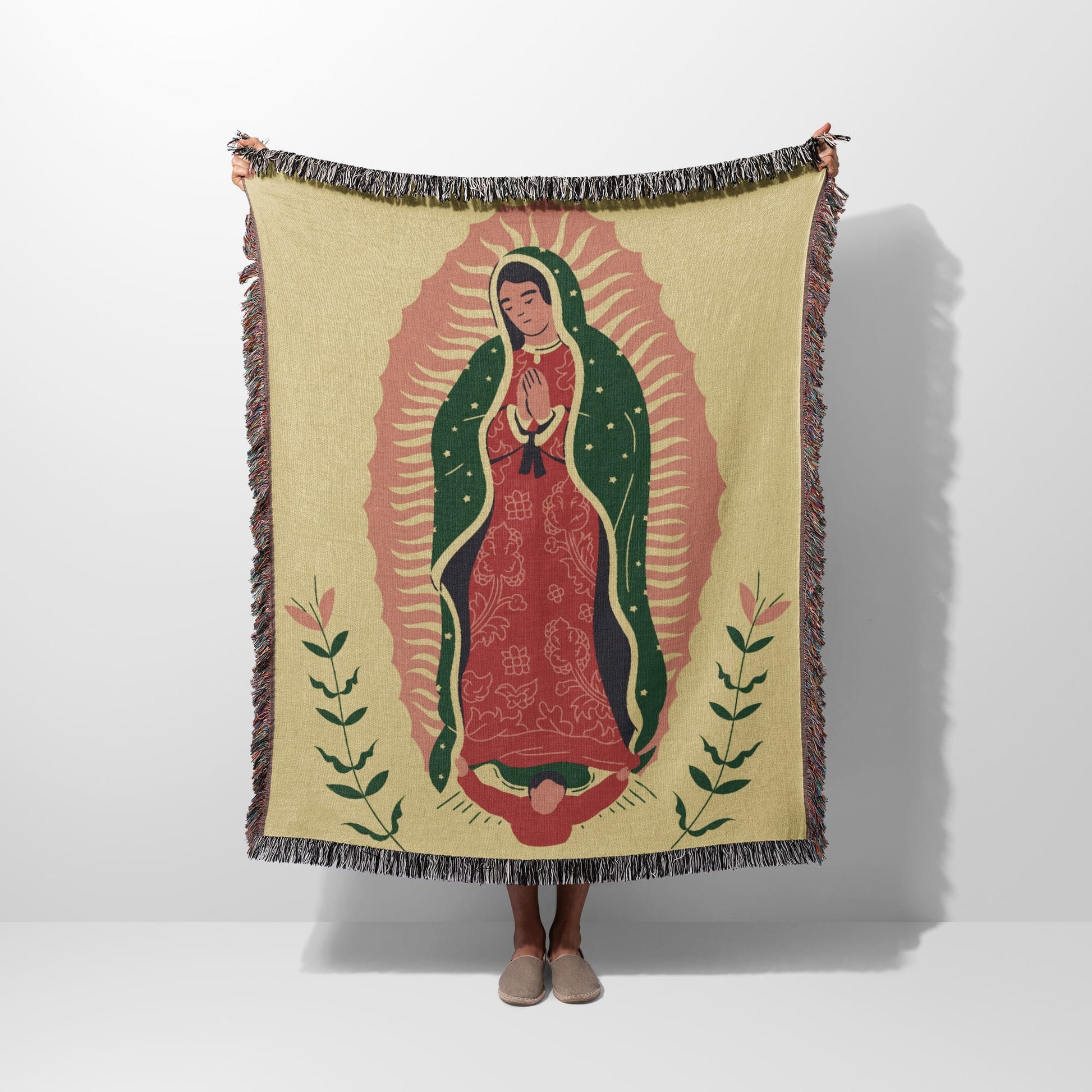 Woven tapestry blanket featuring the Virgin of Guadalupe design.