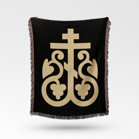 Black blanket with gold Byzantine cross design and fringed edges.