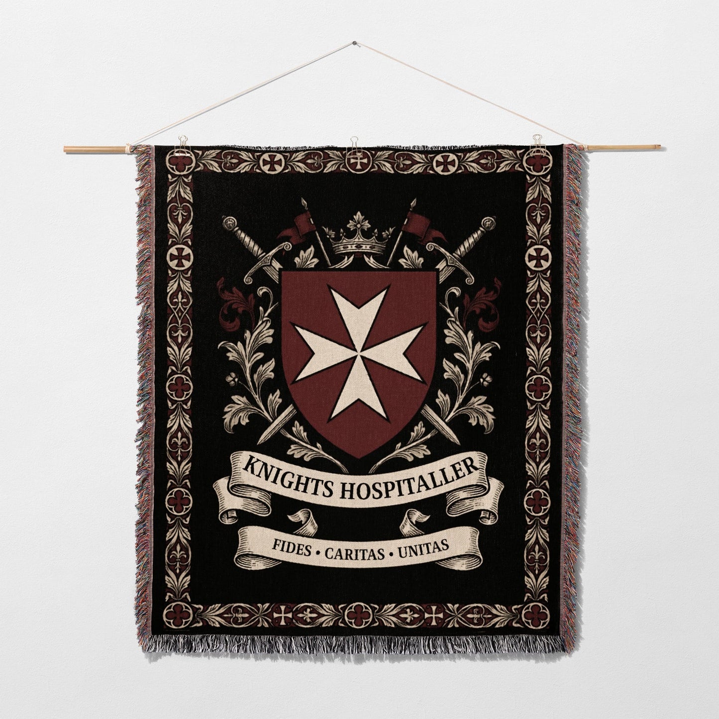 Tapestry featuring Knights Hospitaller crest, swords, crown, and Latin motto.