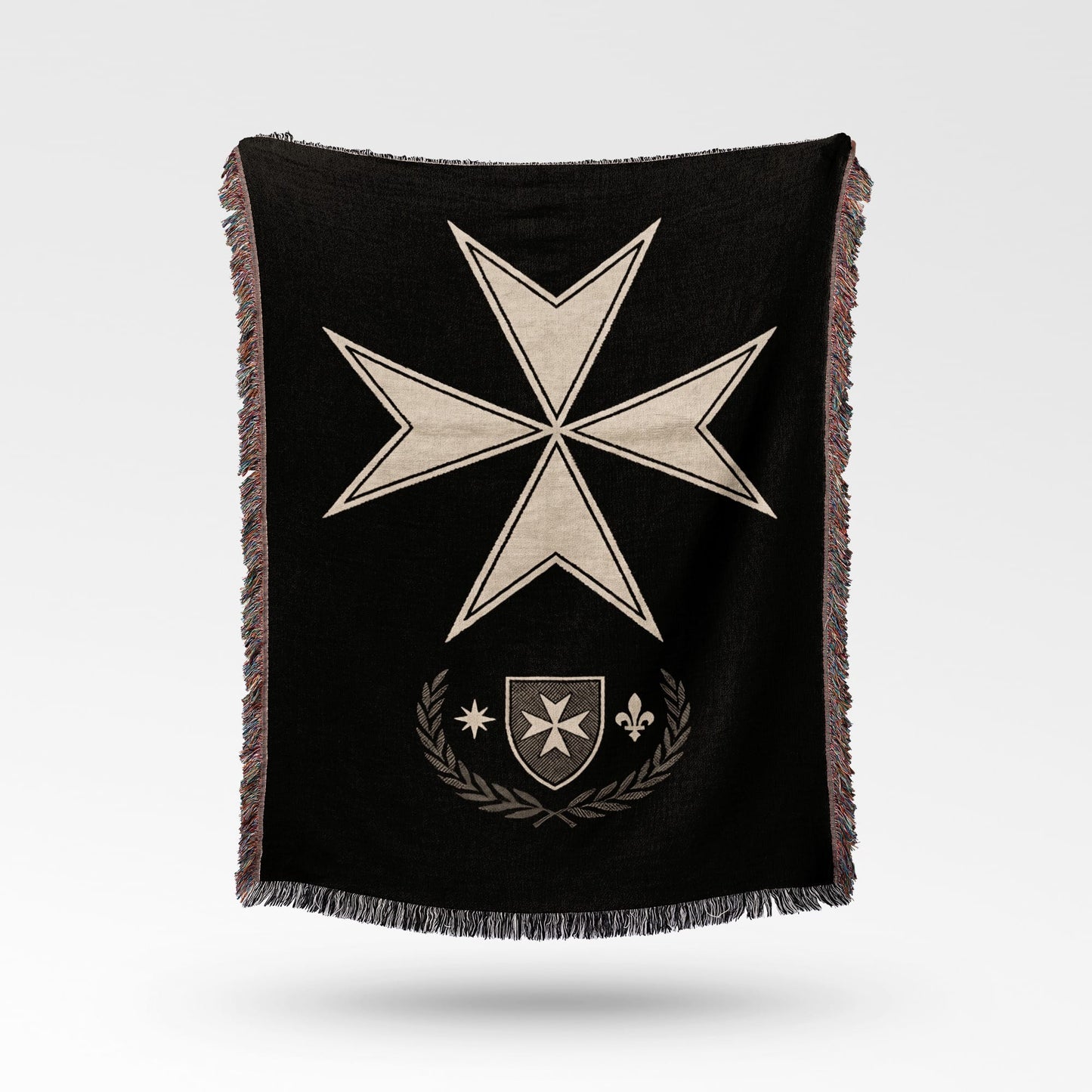 Black throw blanket with a white Maltese cross and a grey laurel wreath.