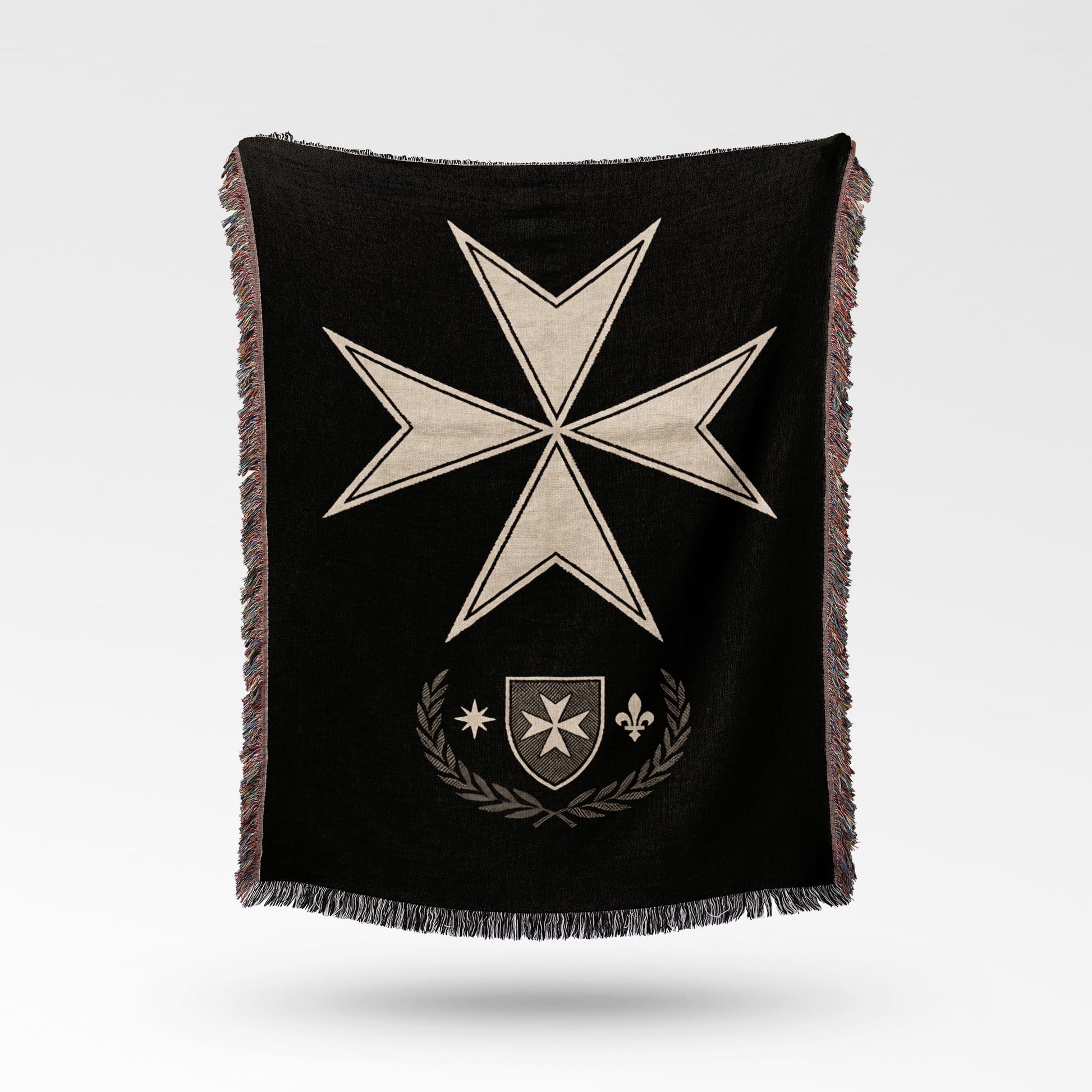 Black throw blanket with a white Maltese cross and a grey laurel wreath.