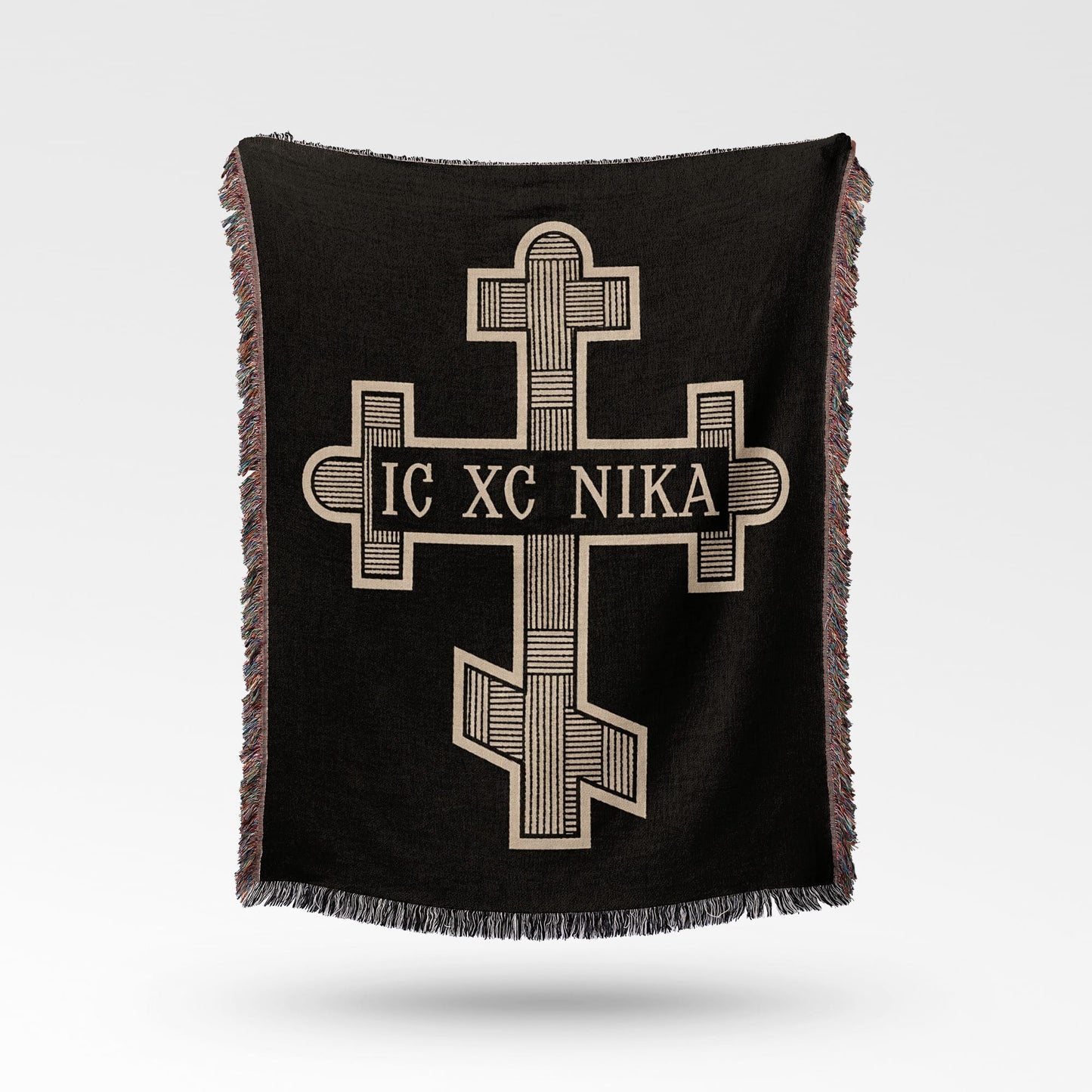 Black woven blanket with Orthodox cross and "IC XC NIKA" inscription.