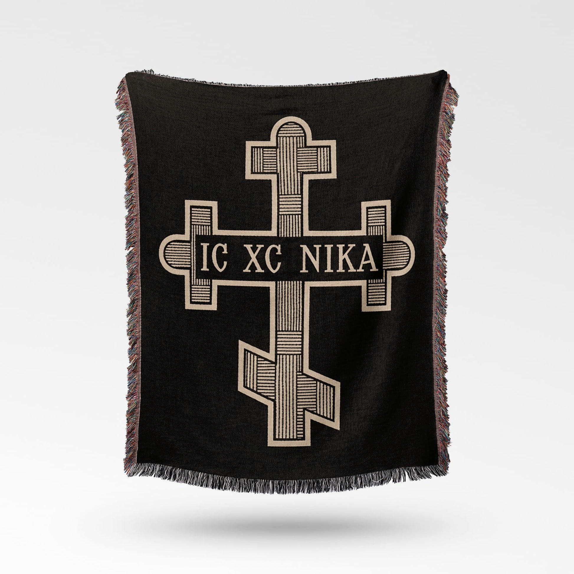Black woven blanket with Orthodox cross and "IC XC NIKA" inscription.