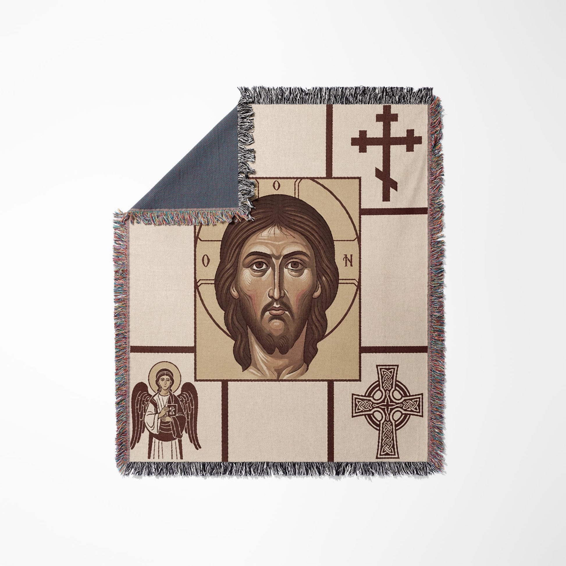 Woven blanket featuring Jesus Christ, an angel, and Celtic cross designs.