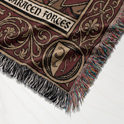 Woven blanket with ornate border and "Saracen Forces" text.