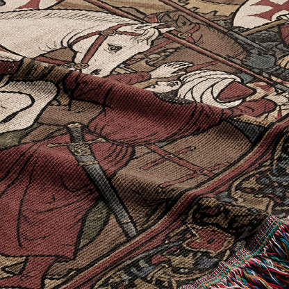 Woven tapestry detail depicting medieval knights on horseback in battle.