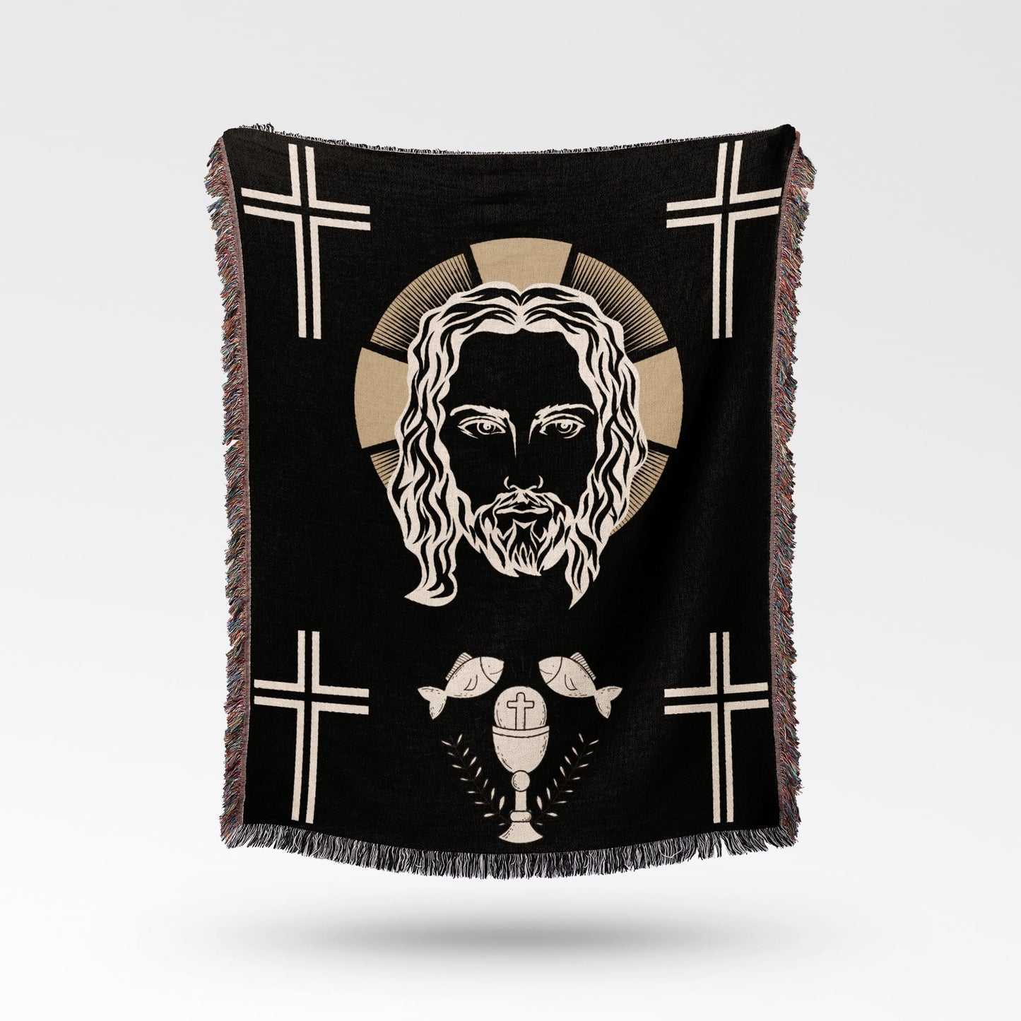 Black throw blanket featuring Jesus' face, crosses, fish, and a chalice.