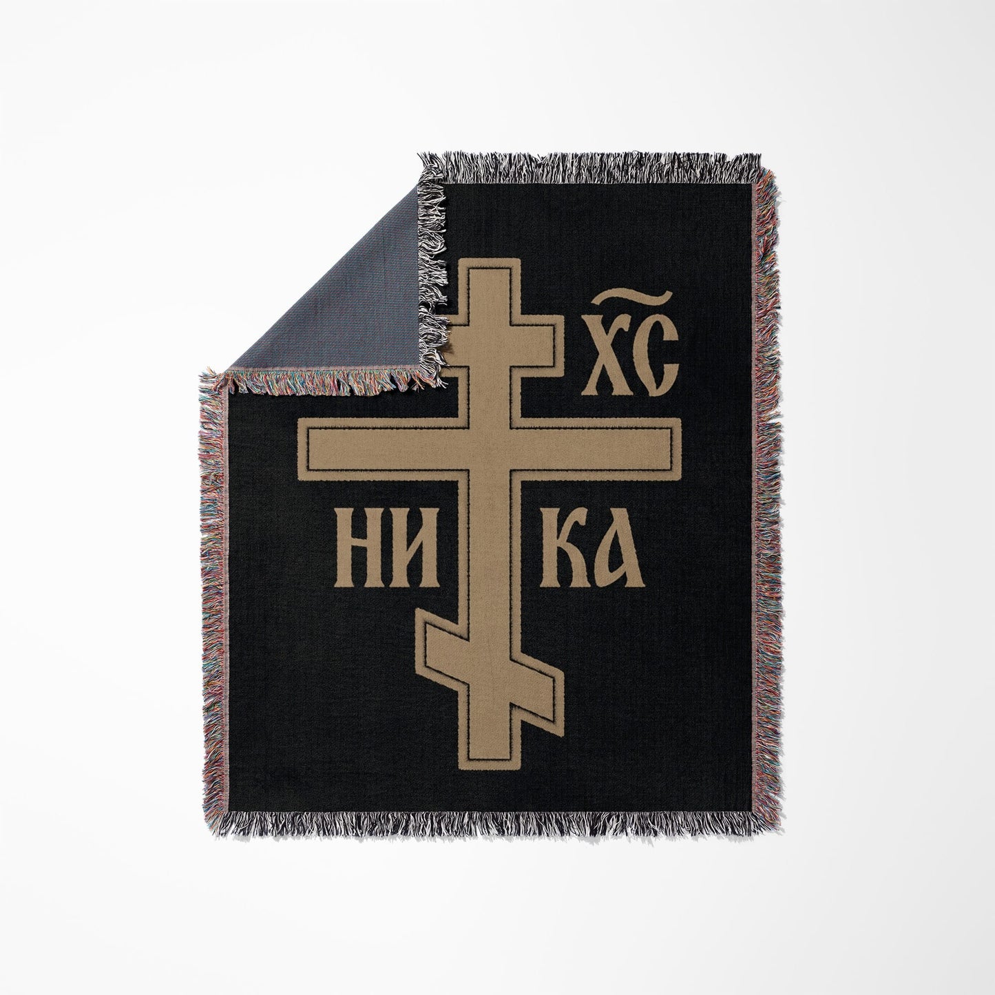 Black woven blanket with a gold Eastern Orthodox cross and "In Hoc Signo Vinces" inscription.