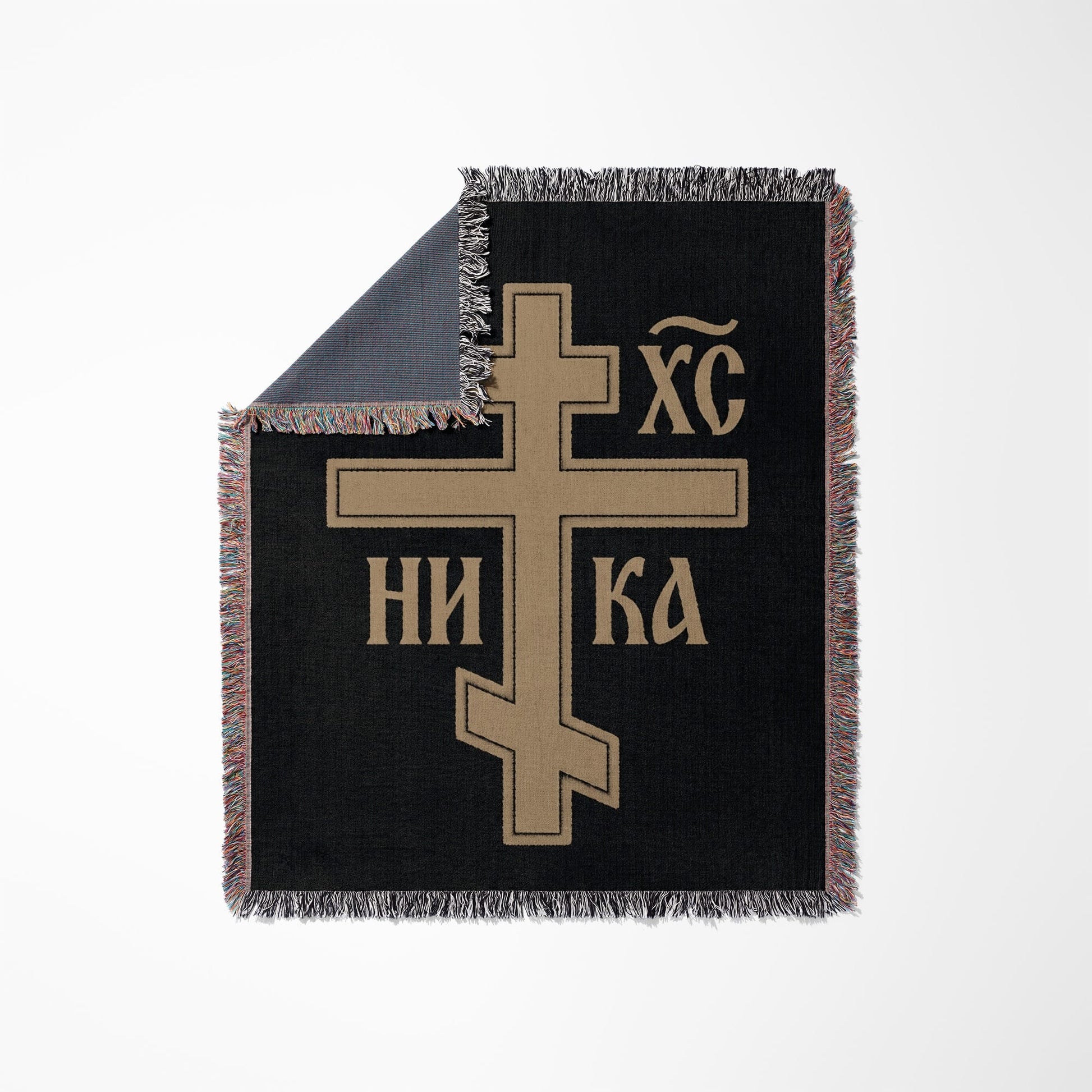 Black woven blanket with a gold Eastern Orthodox cross and "In Hoc Signo Vinces" inscription.