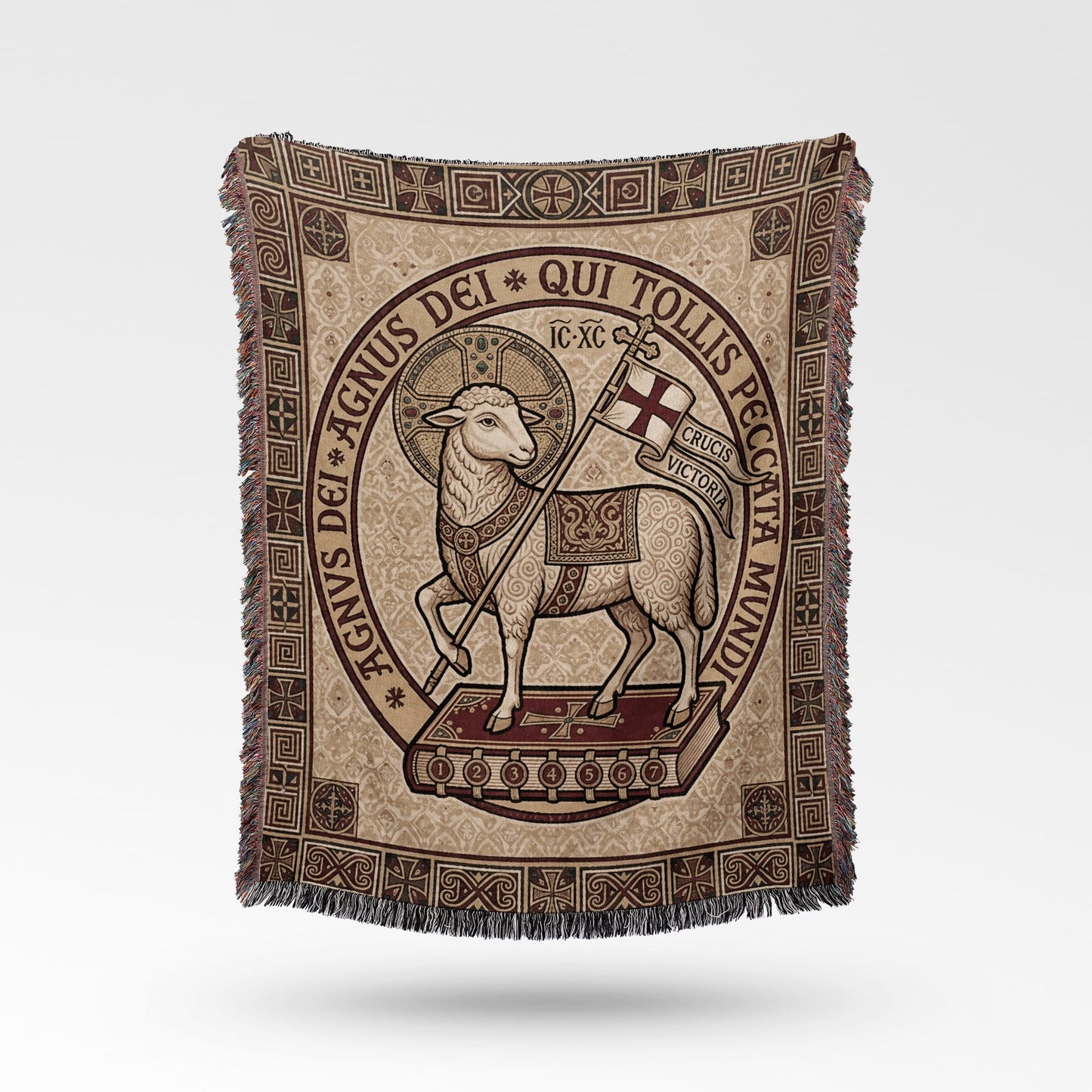 Lamb of God on a book with a banner, surrounded by decorative border.