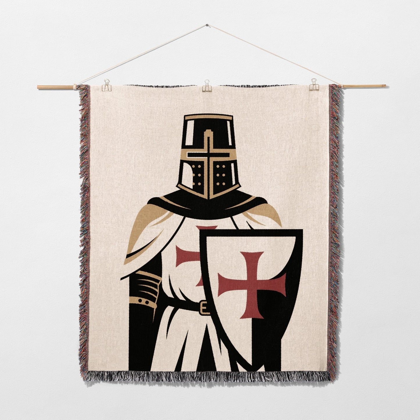 Tapestry depicting a knight in armor with a shield featuring a red cross.
