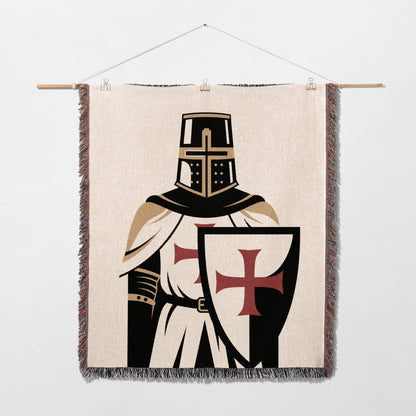 Tapestry depicting a knight in armor with a shield featuring a red cross.