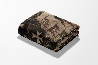 Folded blanket with Knights Templar cross and historical imagery.