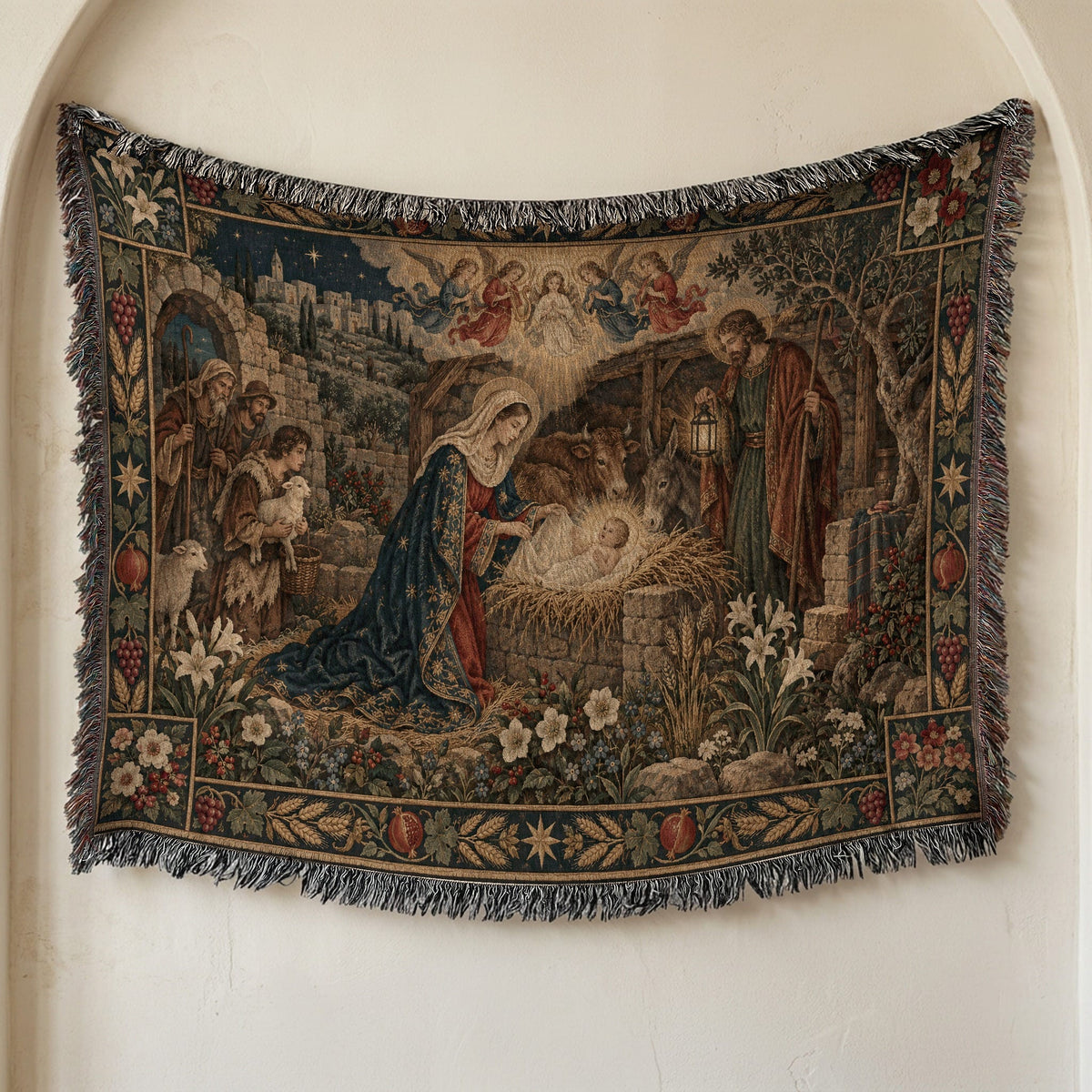 Woven tapestry depicting the Nativity scene with Mary, Joseph, baby Jesus, and animals, with fringed edges.